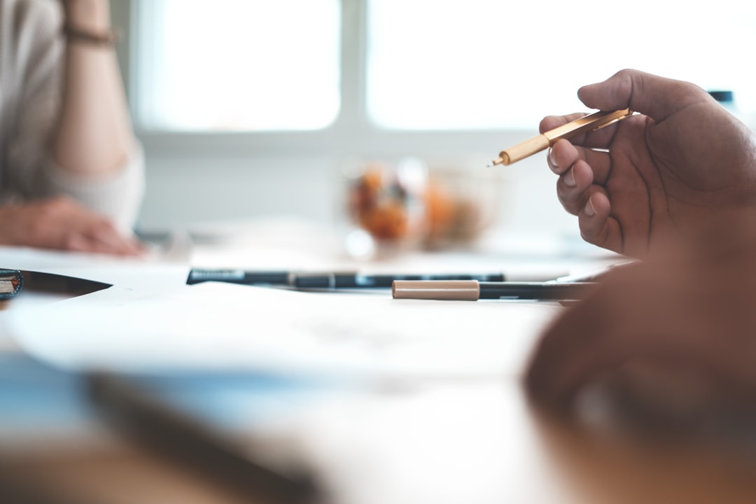 shallow-focus-photo-of-person-wearing-ballpoint-pen-lzto7kkcef4